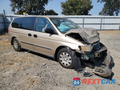 Czwarte zdjęcie samochodu z boku: 1999 HONDA ODYSSEY LX VIN:2HKRL1851XH511430 - miniatura