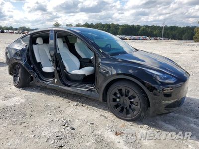 Czwarte zdjęcie samochodu z boku: 2024 TESLA MODEL Y VIN:7SAYGDEE0RA241839 - miniatura