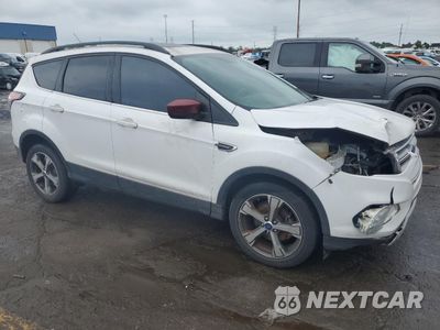 Czwarte zdjęcie samochodu z boku: 2017 FORD ESCAPE SE VIN:1FMCU0GD4HUA30323 - miniatura
