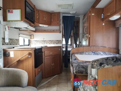 Zdjęcie 6 z 10 samochodu: 2002 FORD ECONOLINE E450 SUPER DUTY CUTAWAY VAN VIN:1FDXE45SX2HA54195 - miniatura