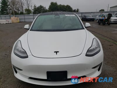 Piąte zdjęcie samochodu w środku: 2021 TESLA MODEL 3 VIN:5YJ3E1EA0MF861885 - miniatura
