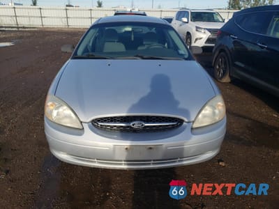 Piąte zdjęcie samochodu w środku: 2001 FORD TAURUS LX VIN:1FAFP52U21G115717 - miniatura