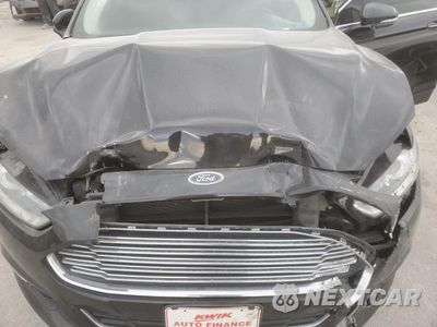 Zdjęcie 13 z 14 samochodu: 2014 FORD FUSION TITANIUM VIN:3FA6P0K92ER241167 - miniatura