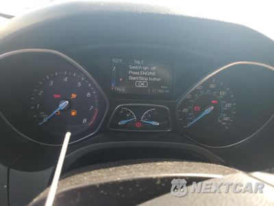 Zdjęcie 9 z 14 samochodu: 2014 FORD FOCUS TITANIUM VIN:1FADP3N25EL357436 - miniatura