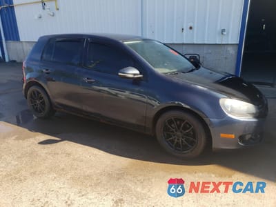 Czwarte zdjęcie samochodu z boku: 2012 VOLKSWAGEN GOLF VIN:WVWCA7AJ4CW342627 - miniatura