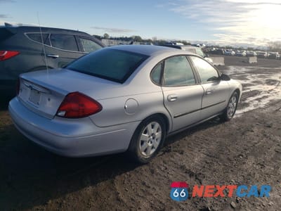 Trzecie zdjęcie samochodu z tyłu: 2001 FORD TAURUS LX VIN:1FAFP52U21G115717 - miniatura