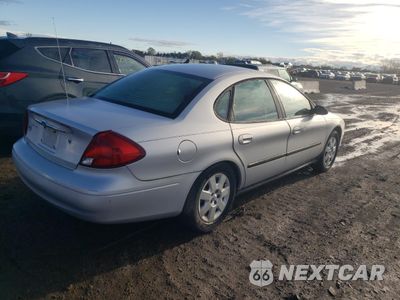 Trzecie zdjęcie samochodu z tyłu: 2001 FORD TAURUS LX VIN:1FAFP52U21G115717 - miniatura