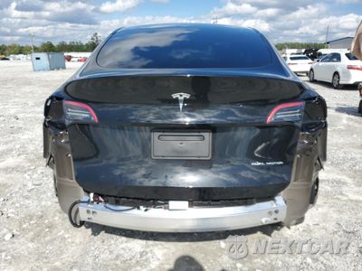 Zdjęcie 6 z 12 samochodu: 2024 TESLA MODEL Y VIN:7SAYGDEE0RA241839 - miniatura
