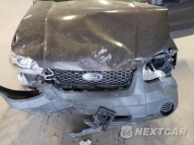Zdjęcie 23 z 26 samochodu: 2007 FORD ESCAPE XLT VIN:1FMYU03177KC04557 - miniatura