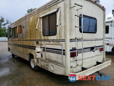 Trzecie zdjęcie samochodu z tyłu: 1990 FORD ECONOLINE E350 MOTOR HOME CHASSIS VIN:1FCKE33G3LHB74056 - miniatura