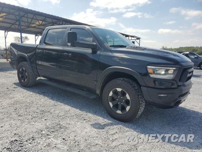 Czwarte zdjęcie samochodu z boku: 2020 RAM 1500 REBEL VIN:1C6RRELT7LN303534 - miniatura