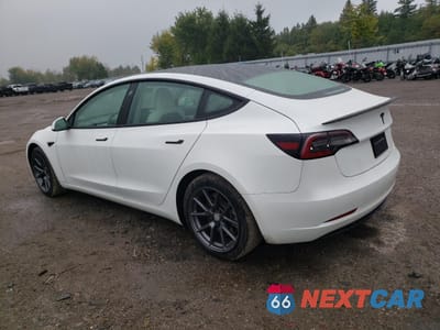 Drugie zdjęcie samochodu z przodu: 2021 TESLA MODEL 3 VIN:5YJ3E1EA0MF861885 - miniatura