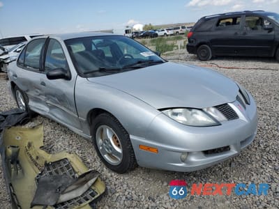 Czwarte zdjęcie samochodu z boku: 2004 PONTIAC SUNFIRE SL VIN:3G2JB52F43S180890 - miniatura