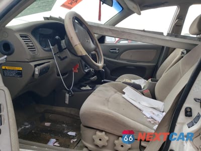 Zdjęcie 7 z 13 samochodu: 2003 HYUNDAI SONATA GL VIN:KMHWF25H23A860138 - miniatura