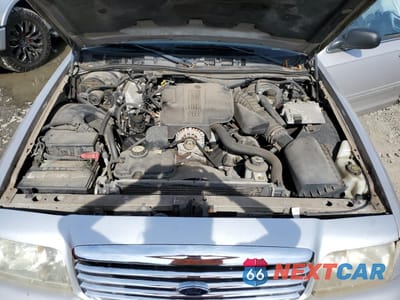 Zdjęcie 11 z 12 samochodu: 2005 FORD CROWN VICTORIA LX VIN:2FAFP74W05X110252 - miniatura