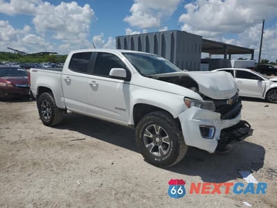Czwarte zdjęcie samochodu z boku: 2016 CHEVROLET COLORADO Z71 VIN:1GCGSDE32G1116419 - miniatura