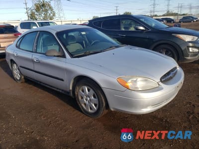 Czwarte zdjęcie samochodu z boku: 2001 FORD TAURUS LX VIN:1FAFP52U21G115717 - miniatura