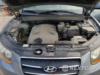 Zdjęcie 12 z 13 samochodu: 2009 HYUNDAI SANTA FE SPORT VIN:5NMSH13E49H299536 - miniatura