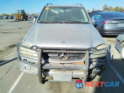 Piąte zdjęcie samochodu w środku: 2001 MERCEDES-BENZ ML 320 VIN:4JGAB54E21A257959 - miniatura