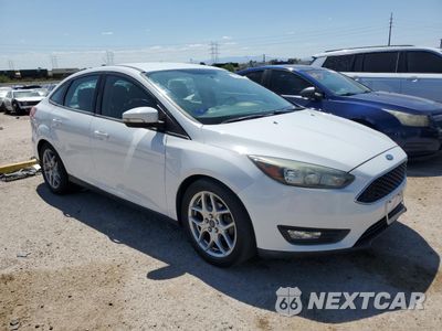 Czwarte zdjęcie samochodu z boku: 2015 FORD FOCUS SE VIN:1FADP3F24FL231018 - miniatura