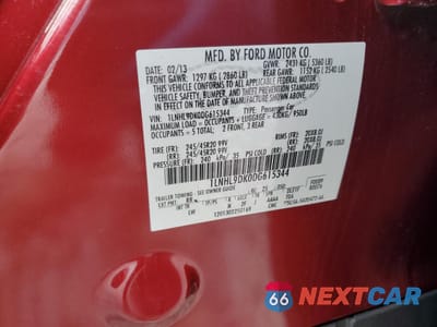 Zdjęcie 12 z 12 samochodu: 2013 LINCOLN MKS VIN:1LNHL9DK0DG615344 - miniatura