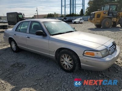 Czwarte zdjęcie samochodu z boku: 2005 FORD CROWN VICTORIA LX VIN:2FAFP74W05X110252 - miniatura