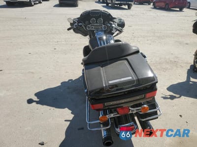 Czwarte zdjęcie samochodu z boku: 2010 HARLEY-DAVIDSON FLHTCU VIN:1HD1FC411AB642240 - miniatura