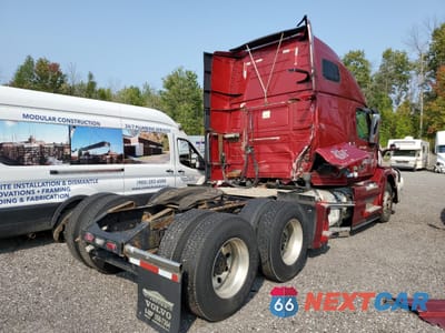 Czwarte zdjęcie samochodu z boku: 2015 VOLVO VN VNL VIN:4V4NC9EH5FN918262 - miniatura