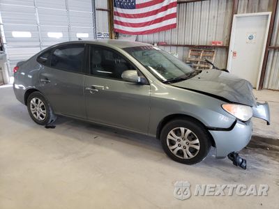 Czwarte zdjęcie samochodu z boku: 2010 HYUNDAI ELANTRA BLUE VIN:KMHDU4AD6AU957446 - miniatura