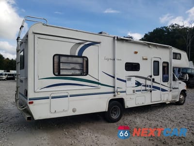 Czwarte zdjęcie samochodu z boku: 2002 FORD ECONOLINE E450 SUPER DUTY CUTAWAY VAN VIN:1FDXE45SX2HA54195 - miniatura