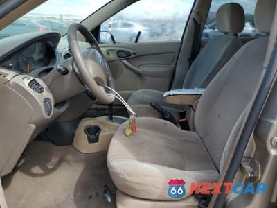 Zdjęcie 7 z 12 samochodu: 2003 FORD FOCUS SE COMFORT VIN:1FAFP34Z23W295528 - miniatura