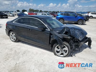 Czwarte zdjęcie samochodu z boku: 2023 AUDI A3 PREMIUM VIN:WAUAUDGYXPA103763 - miniatura