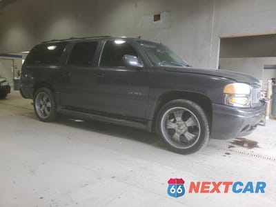 Czwarte zdjęcie samochodu z boku: 2003 GMC YUKON XL DENALI VIN:1GKFK66U53J167510 - miniatura
