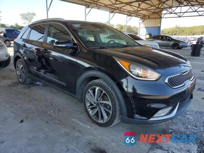 Czwarte zdjęcie samochodu z boku: 2017 KIA NIRO EX TOURING VIN:KNDCE3LC7H5049863 - miniatura