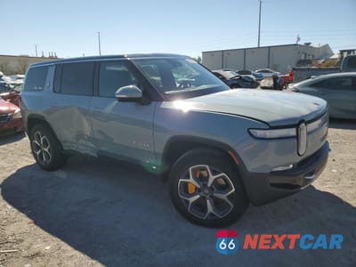 Czwarte zdjęcie samochodu z boku: 2024 RIVIAN R1S ADVENTURE VIN:7PDSGABA6RN036803 - miniatura