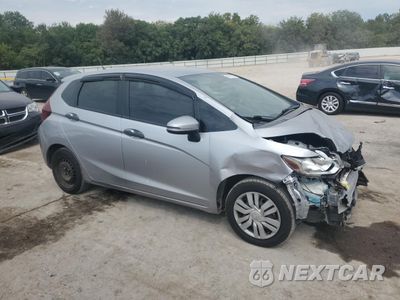 Czwarte zdjęcie samochodu z boku: 2017 HONDA FIT LX VIN:JHMGK5H55HS002573 - miniatura