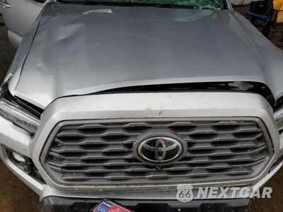 Zdjęcie 11 z 14 samochodu: 2021 TOYOTA TACOMA DOUBLE CAB VIN:3TMCZ5AN1MM407287 - miniatura
