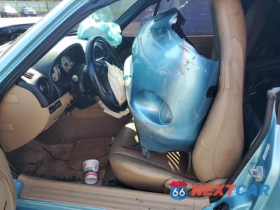 Zdjęcie 7 z 13 samochodu: 2001 MAZDA MX-5 MIATA BASE VIN:JM1NB353810217673 - miniatura