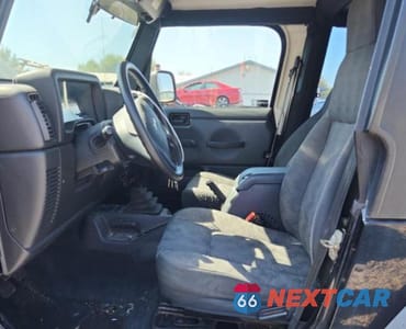 Zdjęcie 7 z 12 samochodu: 2004 JEEP WRANGLER / TJ SPORT VIN:1J4FA49S14P757130 - miniatura