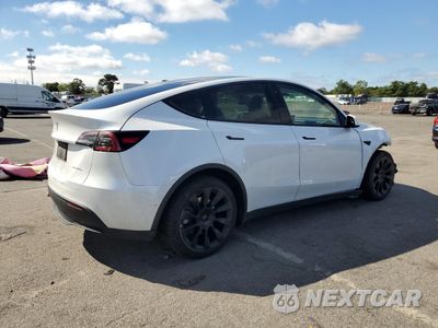 Trzecie zdjęcie samochodu z tyłu: 2022 TESLA MODEL Y VIN:7SAYGDEE1NF565671 - miniatura