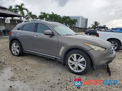 Czwarte zdjęcie samochodu z boku: 2011 INFINITI FX35 VIN:JN8AS1MU3BM711001 - miniatura