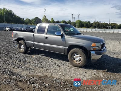 Czwarte zdjęcie samochodu z boku: 1999 GMC NEW SIERRA K1500 VIN:1GTEK19T8XZ535635 - miniatura