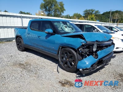 Czwarte zdjęcie samochodu z boku: 2025 RIVIAN R1T ADVENTURE VIN:7FCTGBAAXSN039299 - miniatura