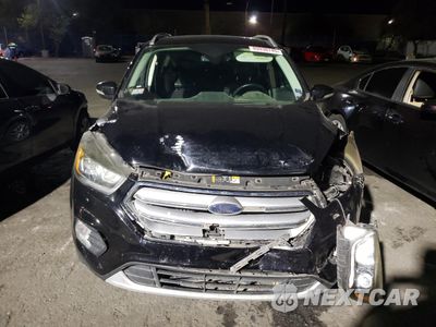 Piąte zdjęcie samochodu w środku: 2017 FORD ESCAPE TITANIUM VIN:1FMCU9J99HUE62219 - miniatura
