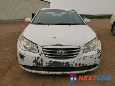 Piąte zdjęcie samochodu w środku: 2010 HYUNDAI ELANTRA BLUE VIN:KMHDU4BD8AU027210 - miniatura