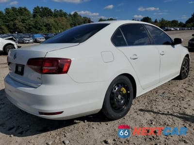 Trzecie zdjęcie samochodu z tyłu: 2018 VOLKSWAGEN JETTA SE VIN:3VWDB7AJ1JM253626 - miniatura