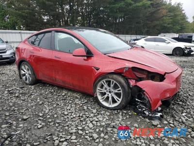 Czwarte zdjęcie samochodu z boku: 2023 TESLA MODEL Y VIN:7SAYGAEE4PF602682 - miniatura