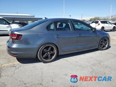 Trzecie zdjęcie samochodu z tyłu: 2016 VOLKSWAGEN JETTA S VIN:3VW167AJ0GM382909 - miniatura