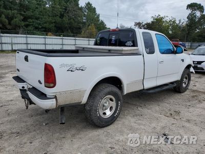 Trzecie zdjęcie samochodu z tyłu: 2002 FORD F150 VIN:1FTRX18W42NA72309 - miniatura