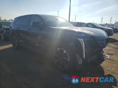 Czwarte zdjęcie samochodu z boku: 2025 CADILLAC ESCALADE IQ SPORT-1 VIN:1GYTEEKL3SU000115 - miniatura